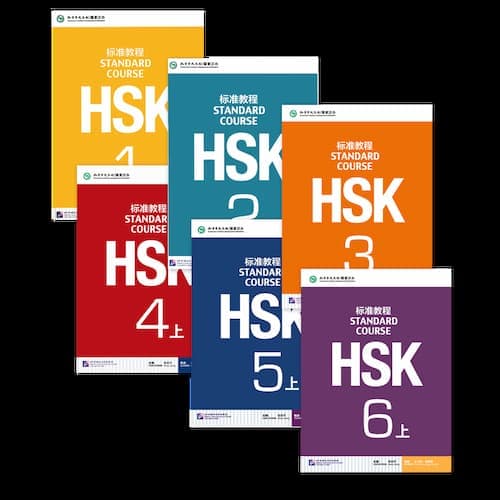 Libros HSK del HSK 1 al HSK 6, los libros se ven ordenados y apilados